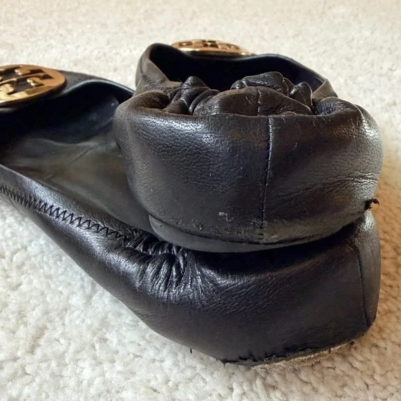 Tory Burch Black Flats with Gold Emblem - Picture 10 of 11